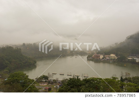 Moving clouds floating above the water of Lake Sanbyeong. A pure fantasy. Moving clouds floating above the water of Lake Sanbyeong. A pure fantasy. 78957865