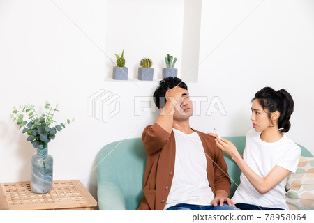 Girl taking care of sick family member 78958064