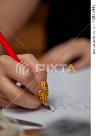 Fashion designer drawings with a pencil sketches Fashion designer drawings with a pencil sketches 78959942