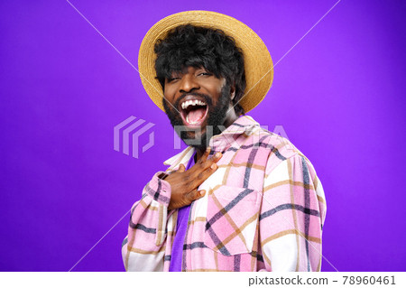 Young african american man looking surprised with open mouth 78960461