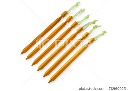 set of yellow aluminum alloy pegs, for attaching a tent, many rods, on a white background set of yellow aluminum alloy pegs, for attaching a tent, many rods, on a white background 78960925