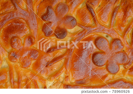 Closed cake from dough with cherry filling. Close up. Closed cake from dough with cherry filling. Close up. 78960926