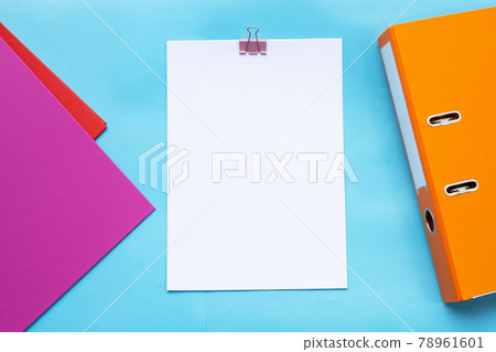 Office folders with paper on white background. Top view 78961601