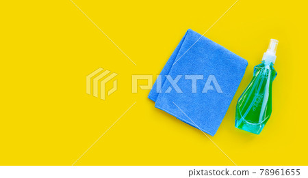 Window cleaner in plastic bottle with blue towel Window cleaner in plastic bottle with blue towel 78961655