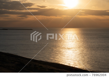 Beautiful evening view of the Sea of Japan seen from the sand dunes Beautiful evening view of the Sea of Japan seen from the sand dunes 78962004