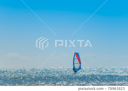 [Windsurfing in the spring storm with white waves] 78963825