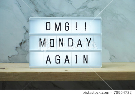 Monday Again word in light box on marble and wooden shelves background Monday Again word in light box on marble and wooden shelves background 78964722