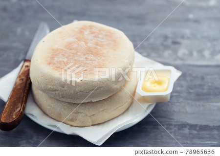 typical portuguese bread of Madeira Bolo do caco with butter 78965636