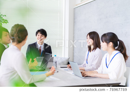 Business person having a meeting in a bright office 78967789