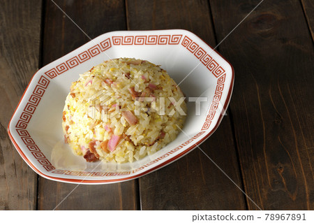 Single item fried rice with various ingredients such as Narutomaki and char siu 78967891