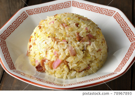 Single item fried rice with various ingredients such as Narutomaki and char siu 78967893