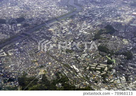 Aerial view of Tsunashima station from above Okurayama station on the Tokyu Toyoko line 78968113