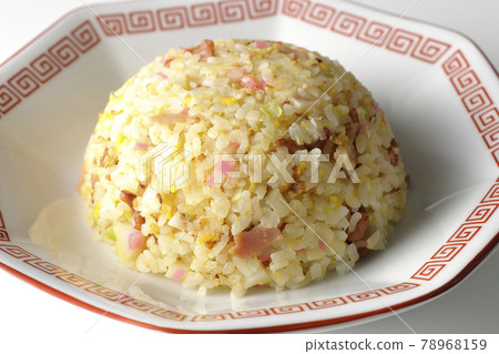 A single item of Gomoku fried rice with various ingredients such as Narutomaki and char siu taken on a white background A single item of Gomoku fried rice with various ingredients such as Narutomaki and char siu taken on a white background 78968159