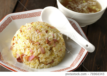 Gomoku fried rice and Chinese soup with various ingredients such as Narutomaki and char siu Gomoku fried rice and Chinese soup with various ingredients such as Narutomaki and char siu 78968343