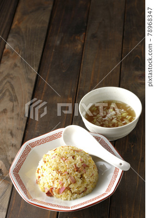 Gomoku fried rice and Chinese soup with various ingredients such as Narutomaki and char siu Gomoku fried rice and Chinese soup with various ingredients such as Narutomaki and char siu 78968347