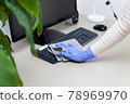 Disinfecting computer, antibacterial spray, rag, safe working from home 78969970