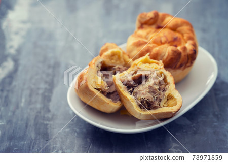 typical portuguese and brazilian chicken small pies on white dish typical portuguese and brazilian chicken small pies on white dish 78971859