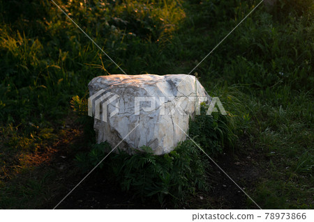 Tourism vacation and travel. Stone stack in foreground and snowcapped mountain tops hills 78973866