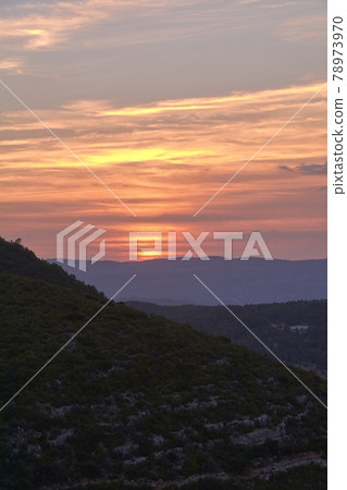 Sunset between the big mountains in summer 78973970