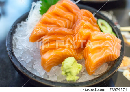Salmon sashimi fresh on ice , Japanese food style. 78974574