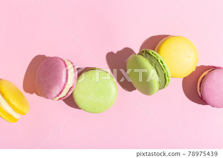 Sweet and colourful french macaroons or macaron dark shadow Sweet and colourful french macaroons or macaron dark shadow 78975439