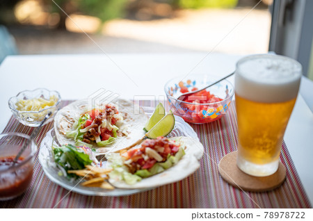 Draft beer on a classic Mexican taco 78978722