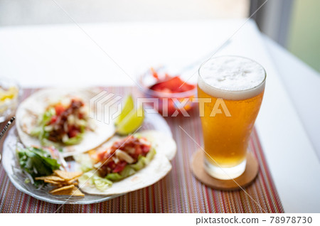 Draft beer on a classic Mexican taco Draft beer on a classic Mexican taco 78978730
