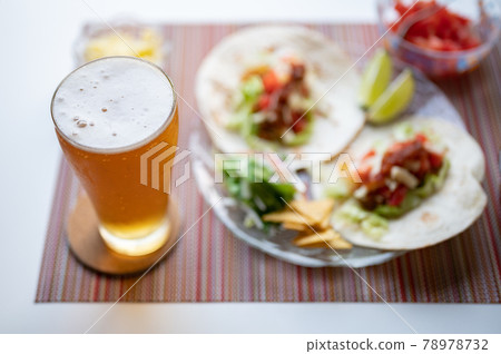 Draft beer on a classic Mexican taco Draft beer on a classic Mexican taco 78978732