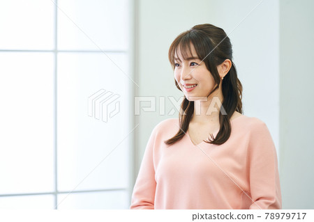Young woman living room office office smiling 78979717