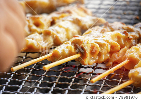Image of grilling yakitori over charcoal 78981976