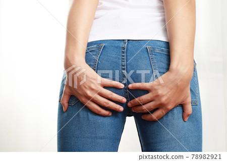 A woman has hemorrhoids, she has a lot of pain in her ass. A woman has hemorrhoids, she has a lot of pain in her ass. 78982921