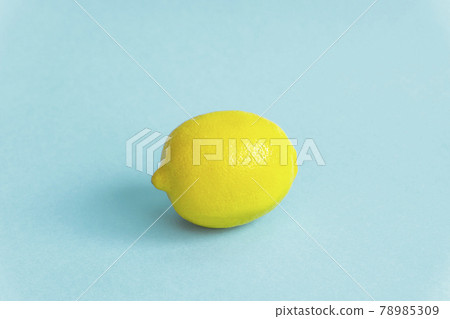 Lemon on light blue background Lemon on light blue background 78985309