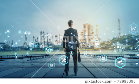 A man looking at an industry and technology factory 78985393