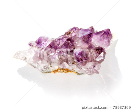 Amethyst gemstone on a white background Amethyst gemstone on a white background 78987369