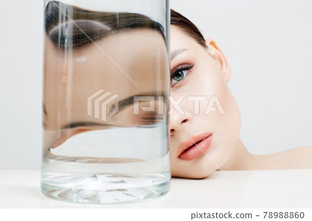 beautiful girl in bottle with water beautiful girl in bottle with water 78988860