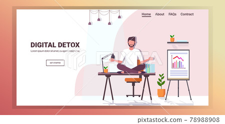 businessman sitting lotus pose on workplace table digital detox concept businessman sitting lotus pose on workplace table digital detox concept 78988908