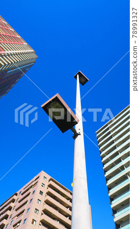 Landscape of buildings, street lights and blue sky (cityscape near Kawaguchi City, Saitama Prefecture) 78991327