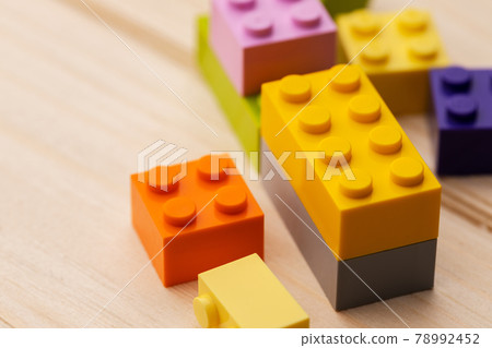 Details of children's plastic building kit close up Details of children's plastic building kit close up 78992452