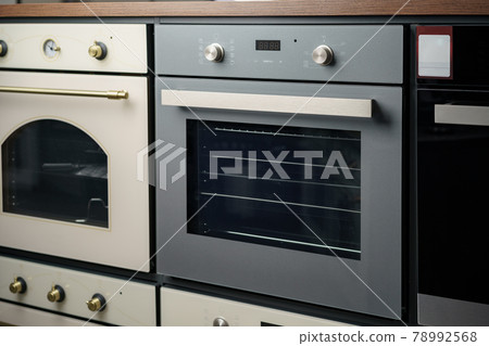 Electrical ovens, home appliances in the store.. Electrical ovens, home appliances in the store.. 78992568