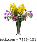 Bouquet of wild flowers in a glass vase isolated on white 78994131