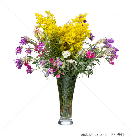 Bouquet of wild flowers in a glass vase isolated on white 78994131