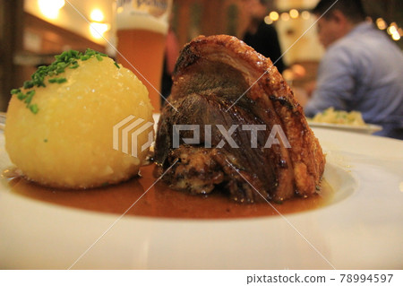 Authentic German food sausage beer Schweinshaxe ham cheese hamburger Authentic German food sausage beer Schweinshaxe ham cheese hamburger 78994597