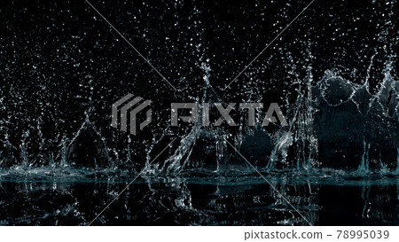 Abstract water splashes isolated on black background Abstract water splashes isolated on black background 78995039