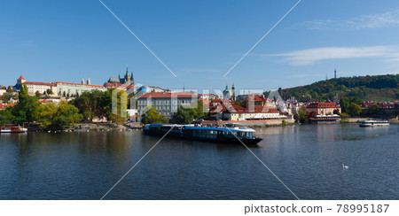Pleasure boat on the Vltava pier in the fall. View of Prague. Pleasure boat on the Vltava pier in the fall. View of Prague. 78995187
