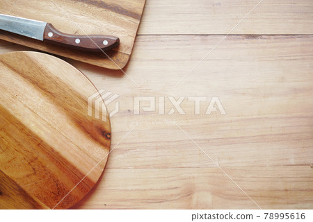 wooden chopping board on table top down wooden chopping board on table top down 78995616