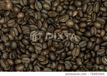 Coffee beans filling the screen close up macro 78995984