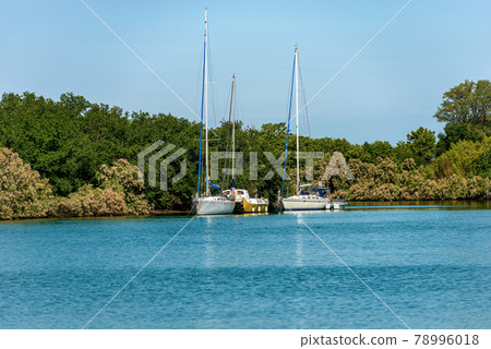 Sailing Boats Moored in Venetian Lagoon - Venice Veneto Italy 78996018