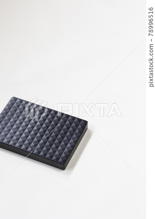 External hard disk drive isolated on white background, modern design for storage computer, laptop. Copy space,top view 78996516