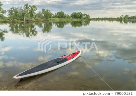stand up paddleboard on lake stand up paddleboard on lake 79000181
