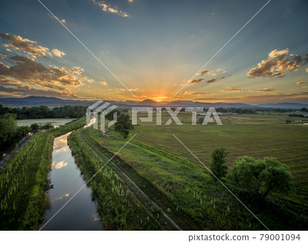 sunset over Rocky Mountains and foothills 79001094